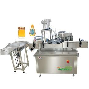 Machine de remplissage de bouteilles de miel